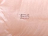 a close up of a pillow with a label on it