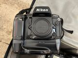 a camera that is sitting in a bag on the ground