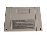 an old nintendo game on a white surface