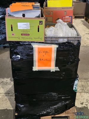 a stack of boxes sitting on top of a pallet