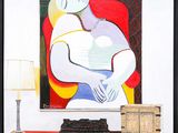 a painting of a woman holding a baby on a table