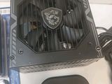 a fan that is sitting on top of a computer