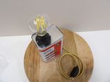 a light that is sitting on top of a wooden table