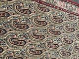 a carpet with a paisley design on it
