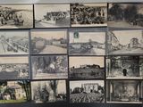 a lot of old black and white photos on the wall