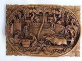a wooden plaque with a picture of a farm scene