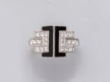 an art deco diamond and onyxine ring