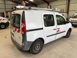 a white van that is parked in a garage