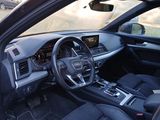 the interior of a car with a steering wheel and dashboard