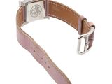leather strap for a watch with a silver buckle on a white background