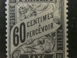 a black and white photo of a stamp with the words 60 cents percevoir