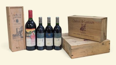 quatre bouteilles de vin et une boîte de vin sur la table