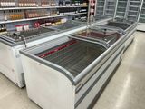 many bottles of wine in the coolers in the store