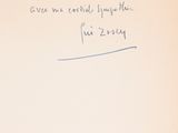 une note manuscrite sur un bout de papier avec le dessin d'un chat