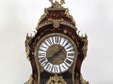 a clock that is sitting on top of a table