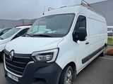 the white van is parked in the parking lot next to other cars