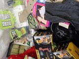 a pile of clothing and other items in a plastic bag