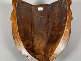 an image of a piece of wood that has been carved into it