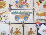 a lot of pictures on the wall of a room
