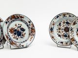 three plates that are sitting next to each other on a table