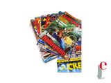 a pile of comic books sitting on top of each other