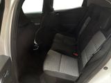the back seats of a car with a seat belt in the back