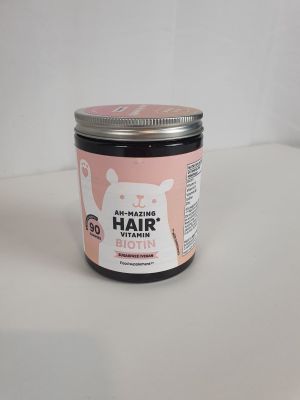 une photo d'un pot de beurre capillaire posé sur une table