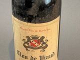a bottle of wine that is sitting on a table