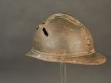 a helmet on a stand on a gray background