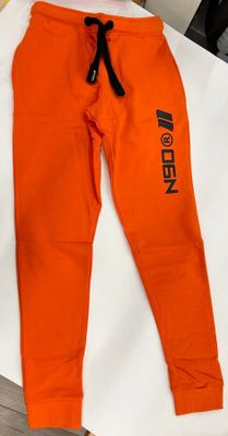 a pair of orange sweatpantss with black lettering on them