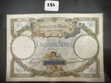un ancien billet de banque français sur lequel figurent des anges