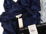 a lot of clothes that are on a table