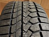 a close up of a tire on a cardboard box