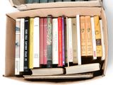a box full of books that are sitting on a table