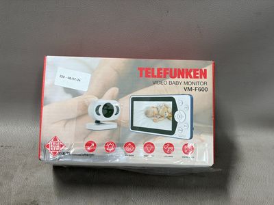une boîte contenant une photo d'un babyphone