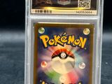 a close up of a pokemon card in a clear case