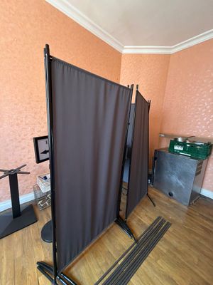 a room that has a screen in the middle of it