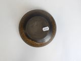 a brown bowl with a tag on the side of it