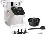 an image of a blender with a bowl and spoon