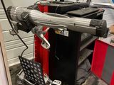 an image of a machine that is sitting in a garage