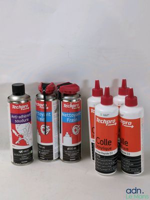 several different types of glues are lined up on a table