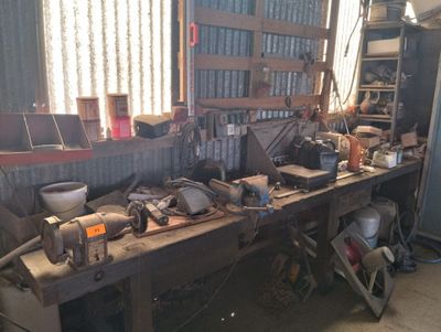 a workbench with a lot of tools on it