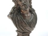 bronze bust of a man with a crown of thorns on his head