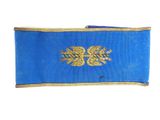 an image of a blue bag with a gold eagle on it