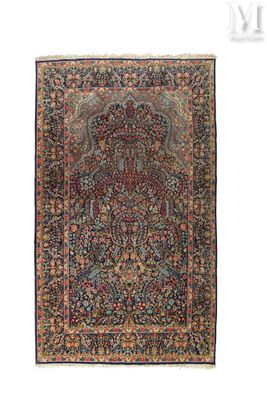 an antique persian rug with a floral design on a white background