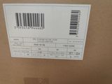 a box with a barcode on it and a price label