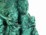 turquoise green sculpture of a man and woman in a boat on a body of water