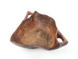 an image of a wooden bowl with a handle on a white surface