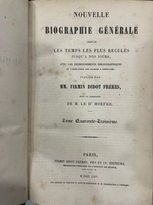 un vieux livre ouvert sur une table