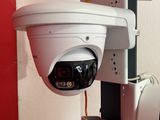 a picture of a security camera attached to a wall